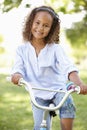 Girl Riding Bike In Park Royalty Free Stock Photo