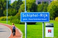 Girl riding bike in Schiphol, near Amsterdam