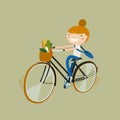 Girl riding bike with vegetarian food. girl riding from a market