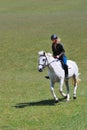 Girl riding Horse