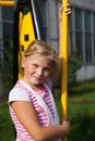 Girl riding rides on a child playground