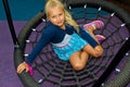 Girl riding on a swing Royalty Free Stock Photo