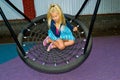 Girl riding on a swing Royalty Free Stock Photo