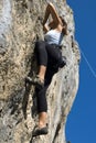 girl rock climbing in Brasov, romania Royalty Free Stock Photo