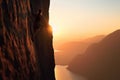 Girl Rock Climbing at Noon on a Cliff