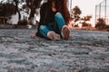 Girl on rock road with warm light