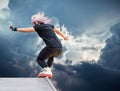 Girl roller performs a trick Royalty Free Stock Photo