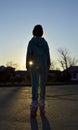 Girl on roller skates during sunset Royalty Free Stock Photo