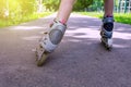 Girl roller skating in the park. Sunset. Royalty Free Stock Photo