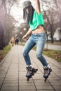 Girl roller skating in park Royalty Free Stock Photo