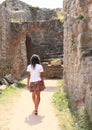 Girl in ruins of castle Pecka