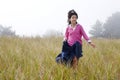 Girl running down hill Royalty Free Stock Photo