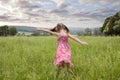 Girl running through long grass Royalty Free Stock Photo