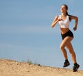 Girl running on sand