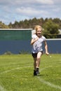 Girl running in sports race Royalty Free Stock Photo