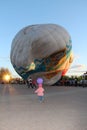 The girl running to a balloon