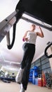 Girl running on the treadmill in the gym Royalty Free Stock Photo