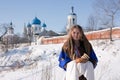 Girl in russian traditional with loaf