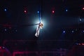 Girl`s aerial acrobatics in the Circus ring. Royalty Free Stock Photo