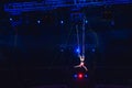 Girl`s aerial acrobatics in the Circus ring. Royalty Free Stock Photo