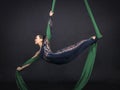 Girl`s aerial acrobatics in the paintings Royalty Free Stock Photo