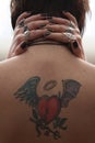 Girl's back tattoo Royalty Free Stock Photo