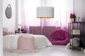 Girl`s bedroom with pink pouf