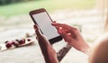 Girl`s hands taking photo of breakfast by smartphone. Smartphone shot food photo. Royalty Free Stock Photo