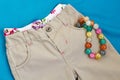 Girl's trousers with underpants and beads