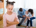 Girl sad because of jealous younger sister to parents Royalty Free Stock Photo