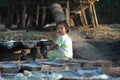 Girl in salt farm, bali, Indonesia