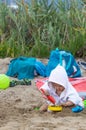 Girl. Sand. Beach. Toys. Summer. Towel. Cute Royalty Free Stock Photo