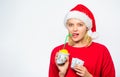 Girl santa hat drink juice lemon wrapped dollar banknote. Symbol of wealth and prosperity. Source of richness. Richness