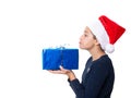 Girl with a santa hat and a funny face Royalty Free Stock Photo