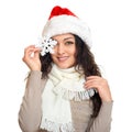 Girl in santa hat portrait with snowflake posing on white background, christmas holiday concept, happy and emotions Royalty Free Stock Photo