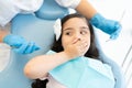 Girl Scared During Checkup At Dental Clinic