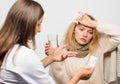Girl in scarf hold tissue while doctor offer treatment. Cold and flu remedies. Tips how to get rid of cold. Recognize