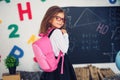 Girl with a school backpack. The concept of school, study, education, friendship, childhood. Royalty Free Stock Photo