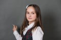 Girl in school uniform standing at the chalkboard Royalty Free Stock Photo