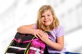 Girl with schoolbag Royalty Free Stock Photo