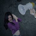 Girl scolded with a megaphone