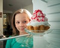 Girl sees the sweet cake Royalty Free Stock Photo