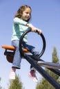 Girl on Seesaw