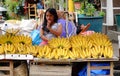 A girl selling banana at the market in Manila, Philippines