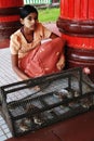 Girl selling birds to free, Myanmar