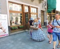 Girl selling lollipops