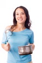 Girl with a serving spoon and pan