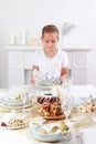 Girl setting table Royalty Free Stock Photo