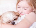 Girl with shih tzu dog Royalty Free Stock Photo