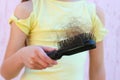 Girl is shocked by amount of hair that has fallen out